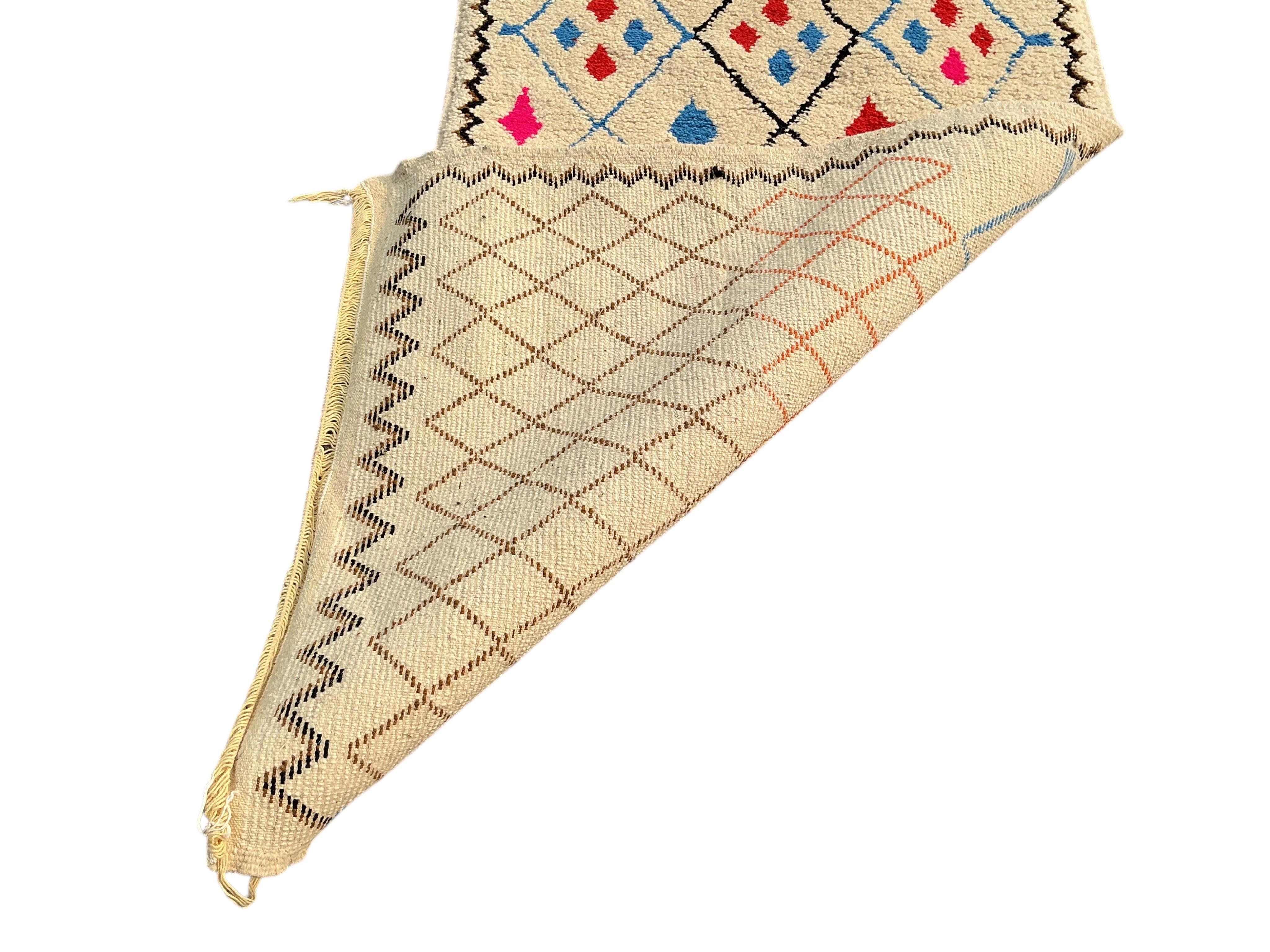 Two Moroccan wool runners, larger 260 x 100cm